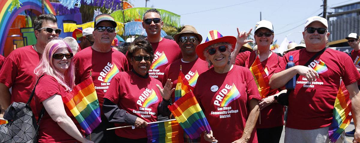 The chancellor, presidents, and the board of trustees celebrate at the annual pride parade