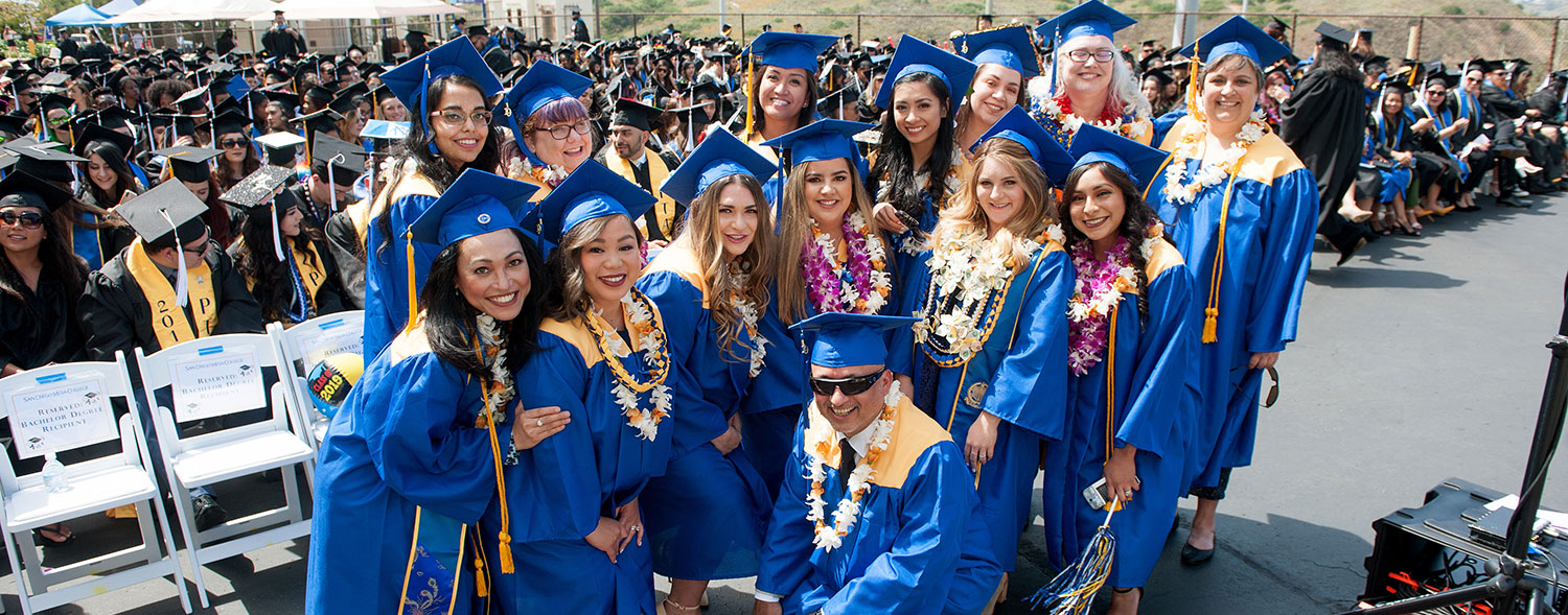 Students from Mesa College’s Health Information Management baccalaureate program proudly pose during their commencement ceremony.