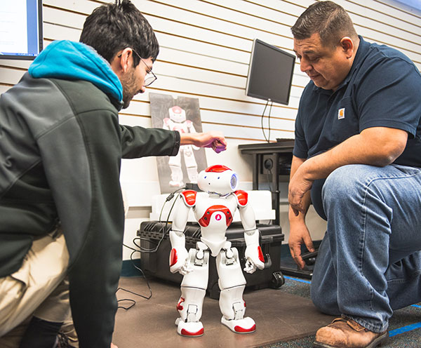 Robots are used as part of the Bakersfield College Industrial Automation baccalaureate program.