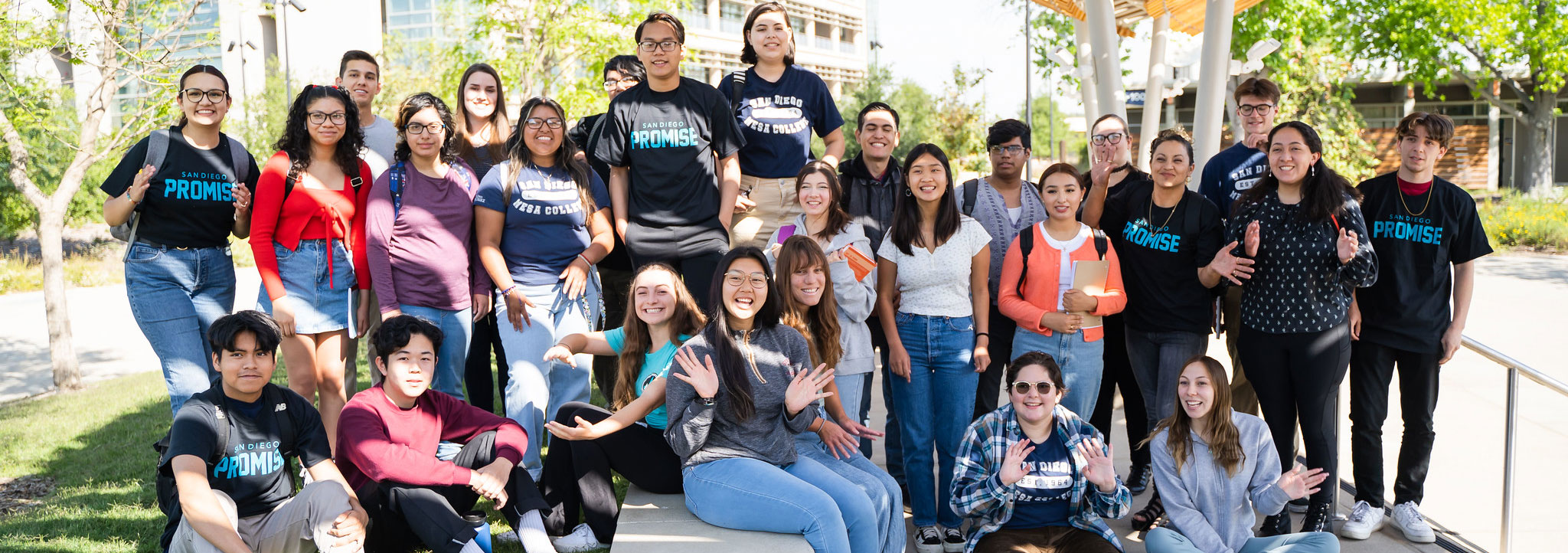 27 promise students are photographed as a group outsitde in the Mesa Quad.