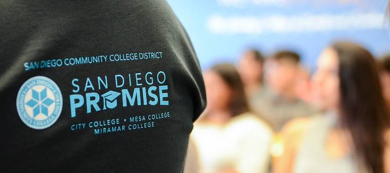 A student wears a San Diego Promise t-shirt