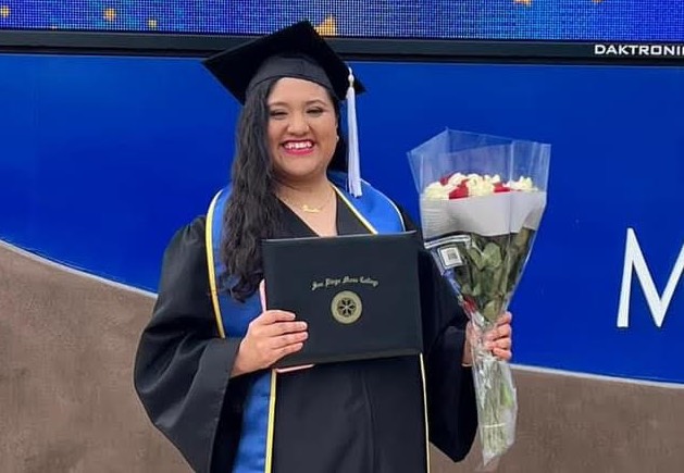 Rosalba Sanchez wearing a cap and gown at Mesa commencement