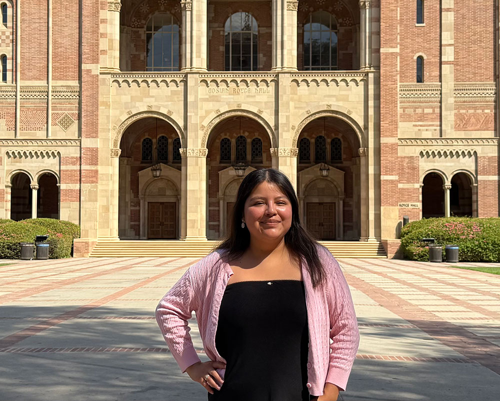 Jeruselen Davila at in front of a building at UCLA