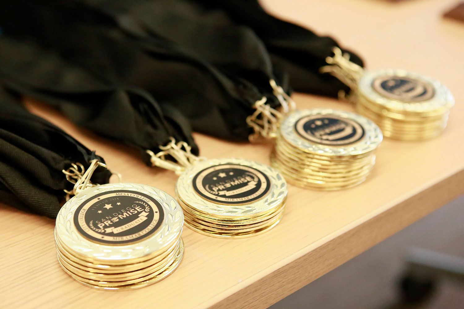 Stacks of gold promise medallions