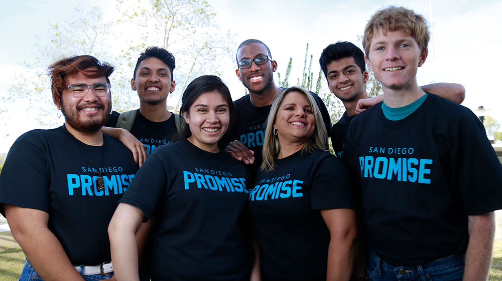Seven students in black tee shirts that say san diego promise
