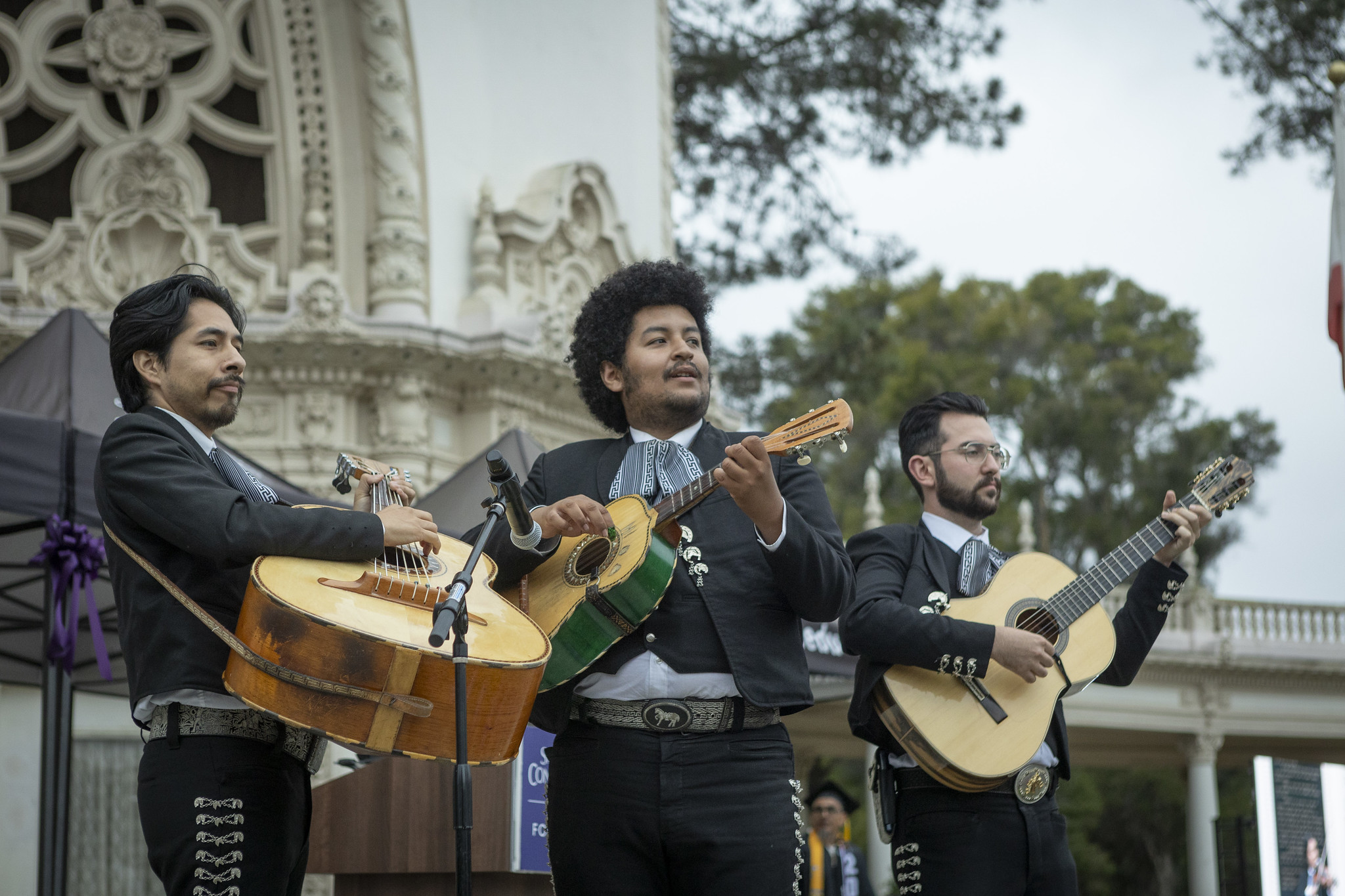 
A mariachi band performs on stage during commencement.
