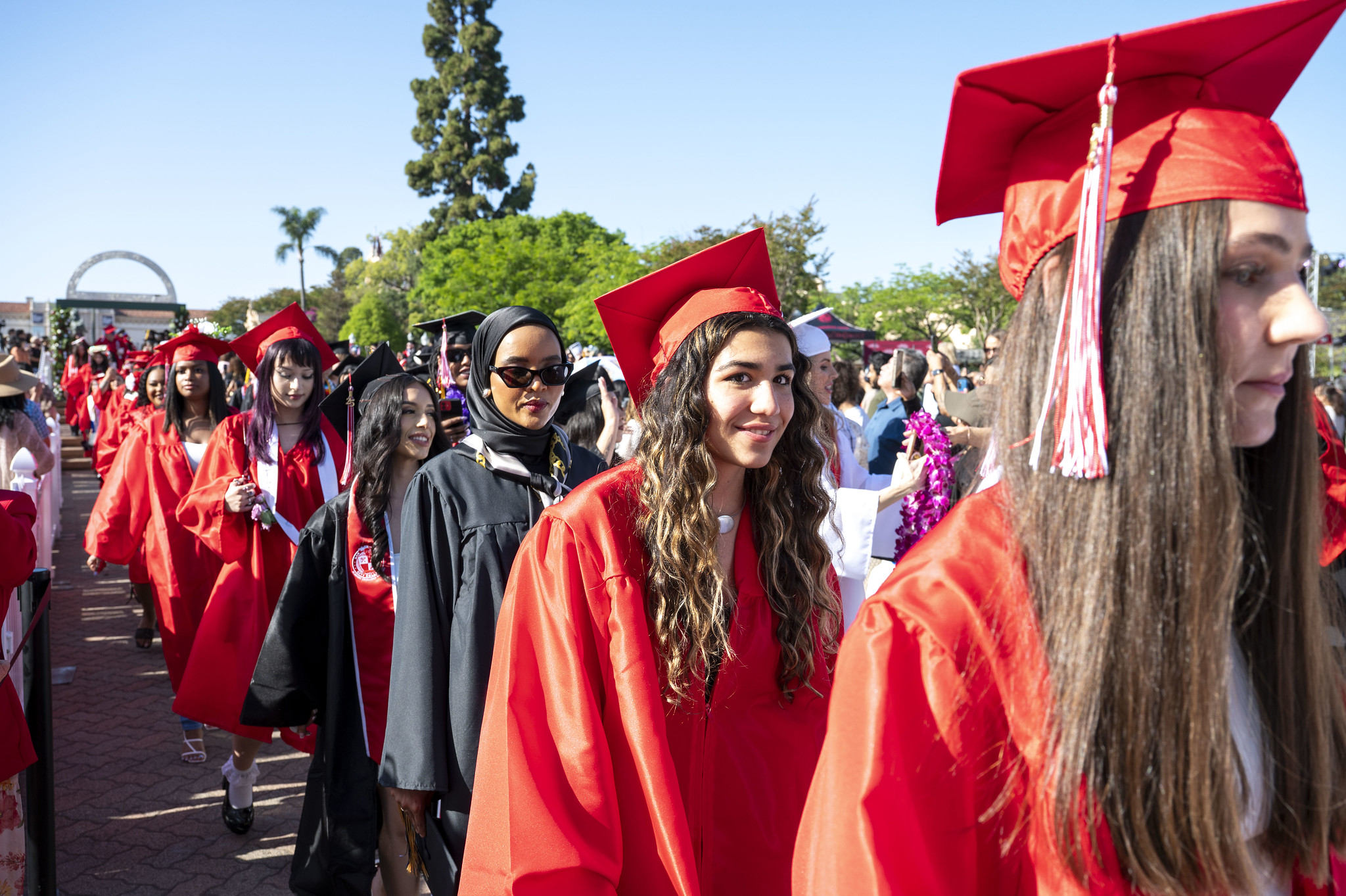 
Graduates line up to receive their diplomas.
