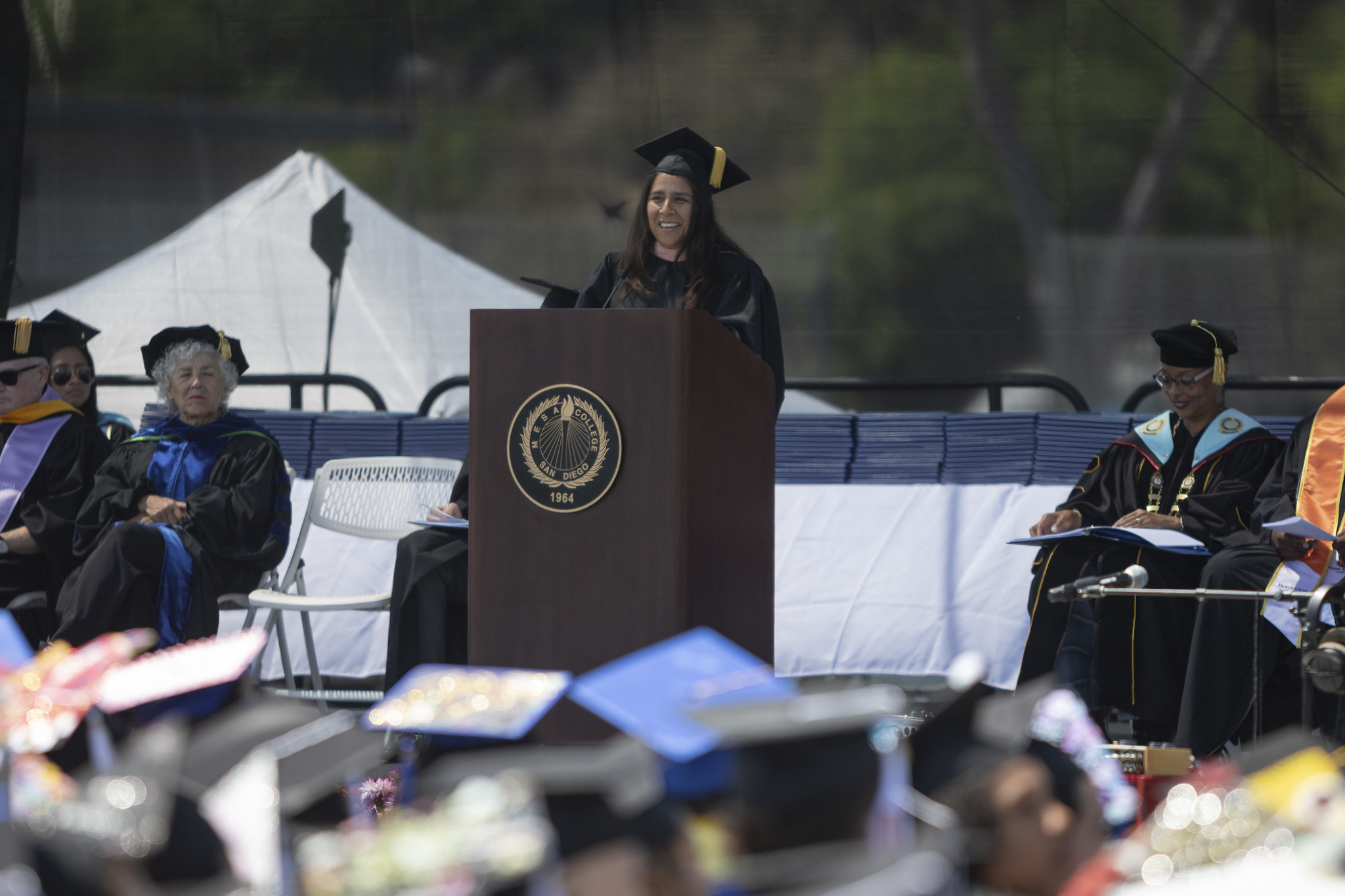 
Board of Trustees President Geysil Arroyo speaks during commencement.
