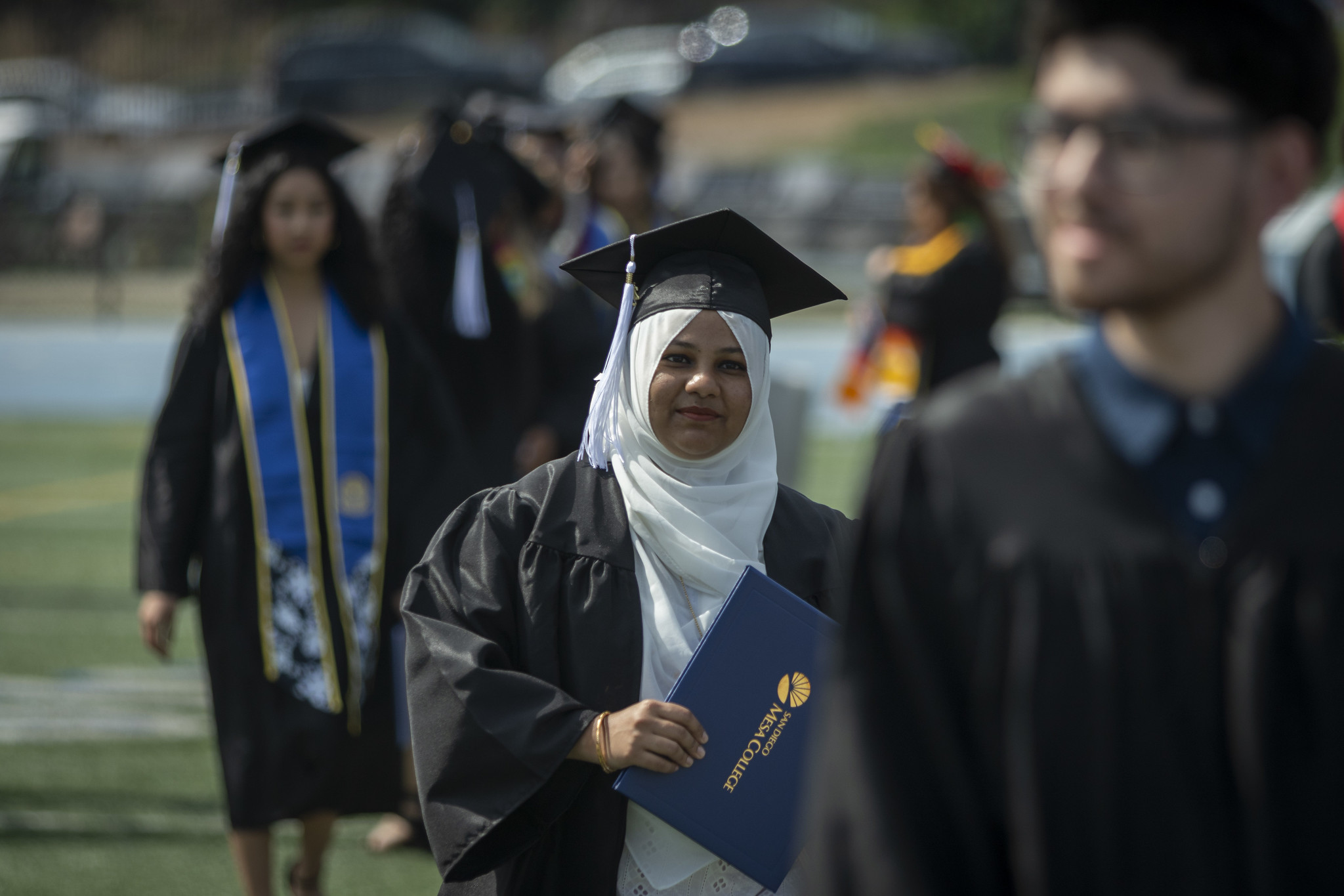 
A graduate with her degree.

