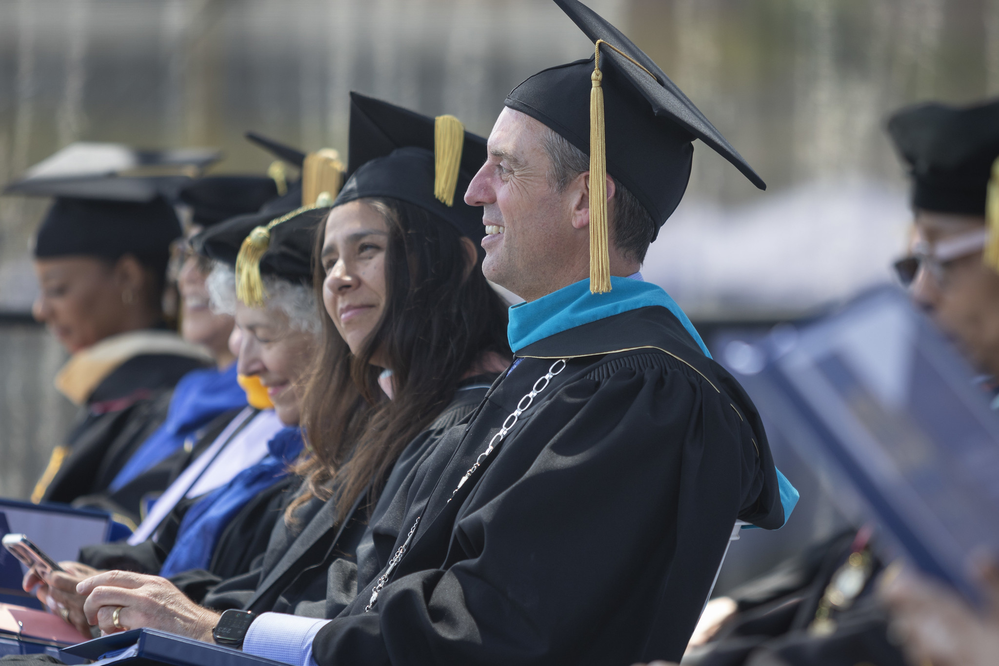 
Chancellor Gregory Smith and Board of Trustees President Geysil Arroyo seated at commencement.
