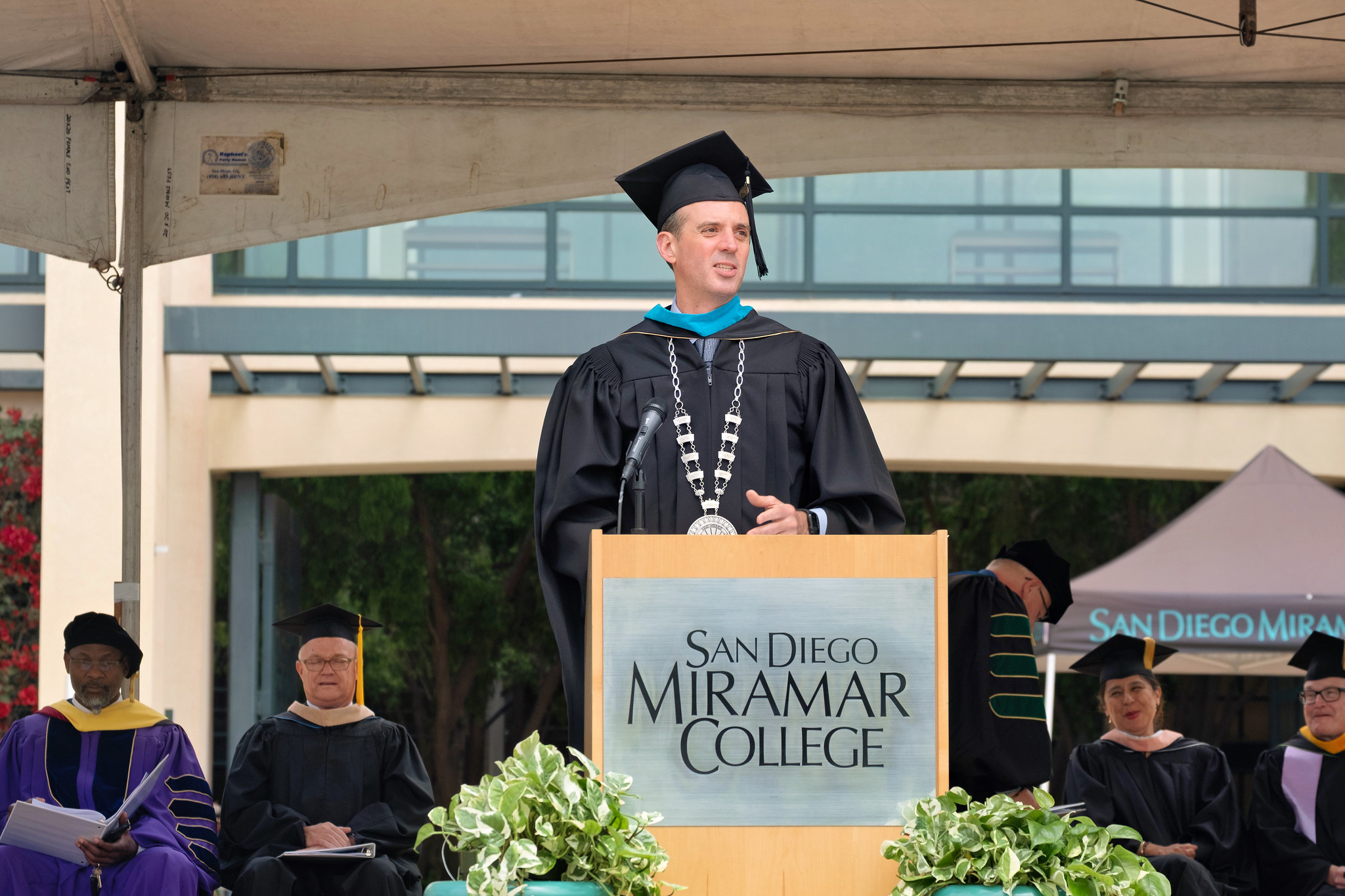 
Chancellor Gregory Smith at a podium speaking at commencement
