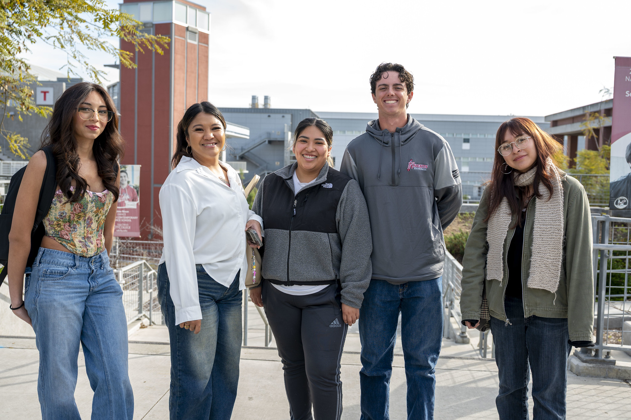 
Five students on City College campus.
